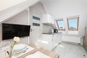 Promenada Apartment Mielno by Renters