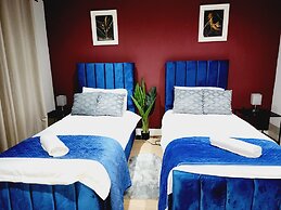 3br-sleeps8-canarywharf-cinemabedroom