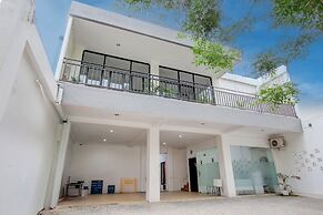 Capital O 93266 Palmier Hotel