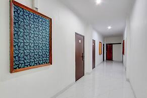 Capital O 93266 Palmier Hotel