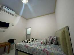 OYO 93308 Lima Saudara Syariah