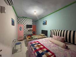 OYO 93308 Lima Saudara Syariah