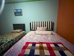 OYO 93308 Lima Saudara Syariah