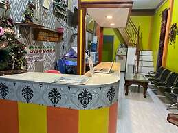 OYO 93308 Lima Saudara Syariah