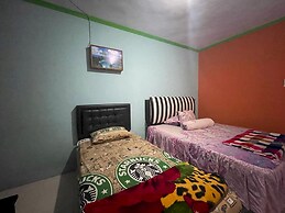 OYO 93308 Lima Saudara Syariah