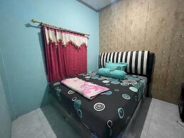 OYO 93308 Lima Saudara Syariah