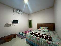 OYO 93308 Lima Saudara Syariah