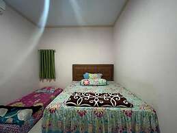 OYO 93308 Lima Saudara Syariah