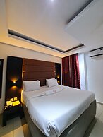 Axor Hotel &Suites
