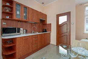 Studio centrum Poznań by Renters