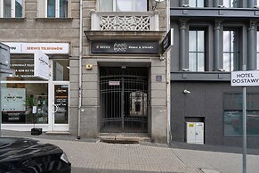 Studio centrum Poznań by Renters