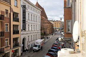 Studio centrum Poznań by Renters