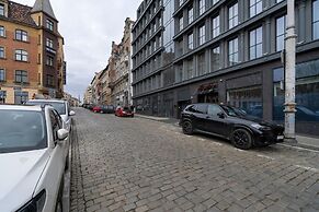 Studio centrum Poznań by Renters