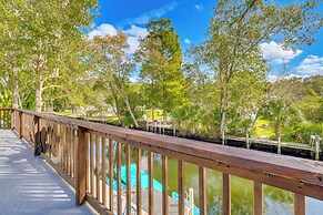 Spring Hill Home on Canal: Boat Dock & Pool Table!