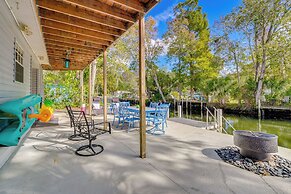 Spring Hill Home on Canal: Boat Dock & Pool Table!