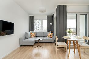 Gray Cosy Studio in Poznań by Renters