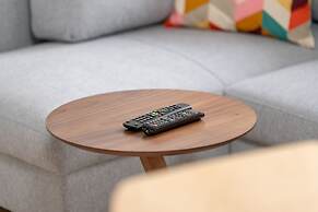 Gray Cosy Studio in Poznań by Renters