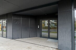 Gray Cosy Studio in Poznań by Renters