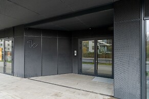 Gray Cosy Studio in Poznań by Renters