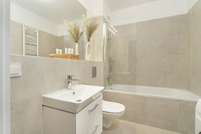 Gray Cosy Studio in Poznań by Renters