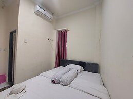 OYO 93332 Kharis Home Stay