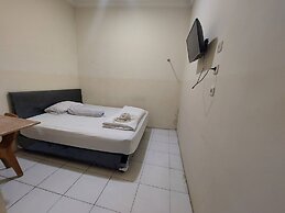 OYO 93332 Kharis Home Stay