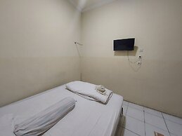 OYO 93332 Kharis Home Stay