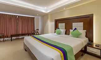 Treebo Suvarna Comforts