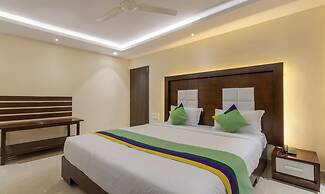 Treebo Suvarna Comforts