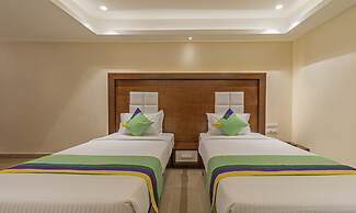 Treebo Suvarna Comforts