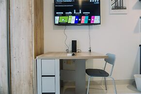 Homey And Warm Studio At West Vista Apartment