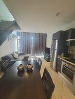 RT PROPERTIES  @ THE GARDENS