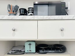 Renovated Modern & Minimalist Century City Studio Condo by RedAwning