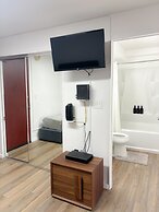 Renovated Modern & Minimalist Century City Studio Condo by RedAwning