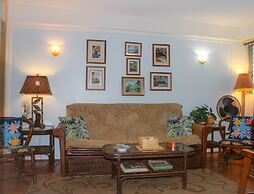 Retro Oasis Hawaiian King Apartment 1 Bedroom Condo by RedAwning