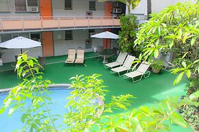 Retro Oasis Hawaiian King Apartment 1 Bedroom Condo by RedAwning