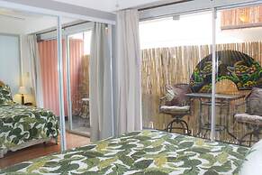 Retro Oasis Hawaiian King Apartment 1 Bedroom Condo by RedAwning