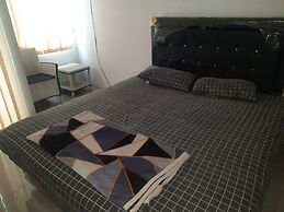 OYO Life 93139 Apartemen Grand Sentraland By Evi