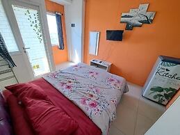 OYO Life 93139 Apartemen Grand Sentraland By Evi