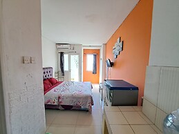 OYO Life 93139 Apartemen Grand Sentraland By Evi