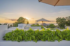 Palm Grove Villas & Hotel