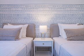 Palm Grove Villas & Hotel
