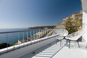 Sesimbra Cliff by Saudade