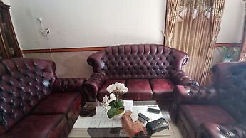 SPOT ON 93376 Roemah Ambarrukma 185 Syariah