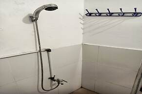 SPOT ON 93385 Penginapan Hj Lilis 2 Syariah