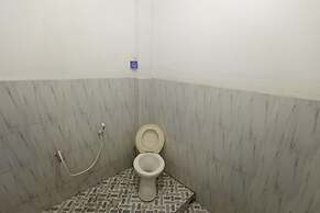 SPOT ON 93385 Penginapan Hj Lilis 2 Syariah