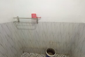 SPOT ON 93385 Penginapan Hj Lilis 2 Syariah