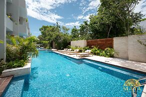 NHOA 107B Lux 1BR Condo Pool access in Aldea Zama