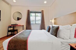 Hotel Consulate By BookMeriHotel