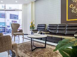 OYO Townhouse 156 Rose Hotel Apartments.